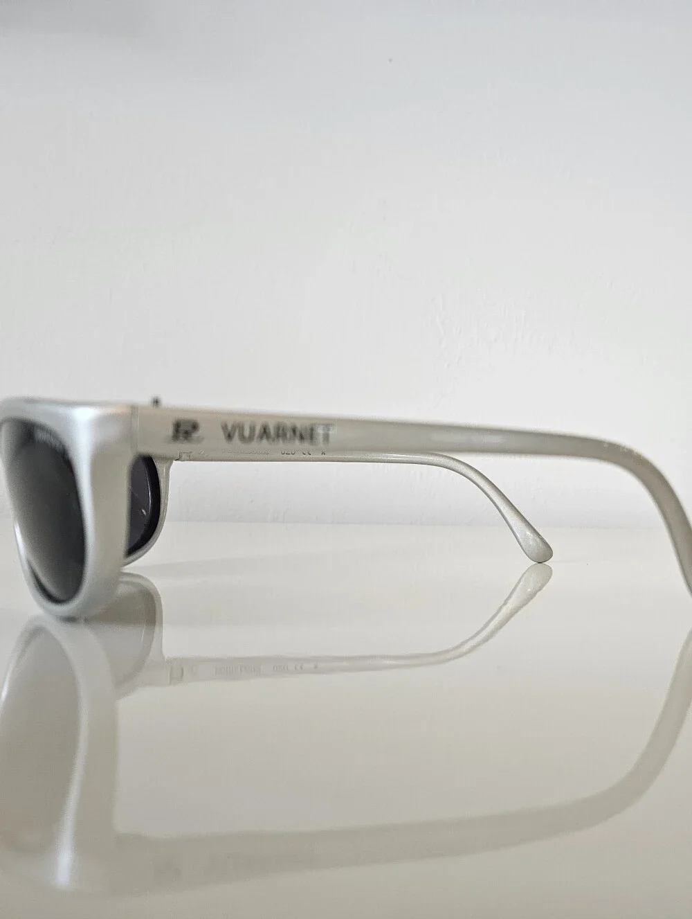Vuarnet Silver Oval Sunglasses with Dark Lenses